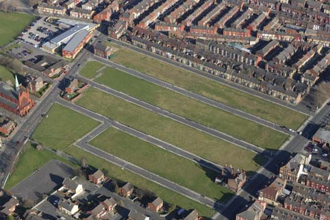 The site of cleared 19th-century houses in Edge Hill remains undeveloped (April 2012)